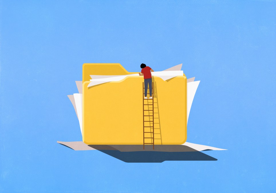 Person on ladder looking into large folder with messy paperwork spilling out. (Stock illustration/Getty Images)