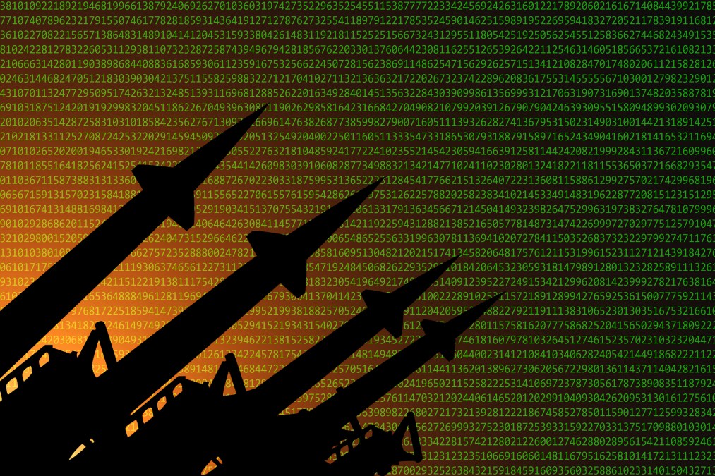 Binary code and missile launchers. (Anton Petrus/Getty Images)